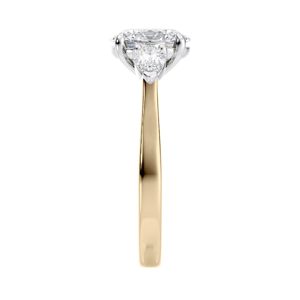 Oval natural diamond 3 stone engagement ring with pear shaped side stones 18ct gold end view.