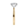 Oval natural diamond 3 stone engagement ring with pear shaped side stones 18ct gold end view.