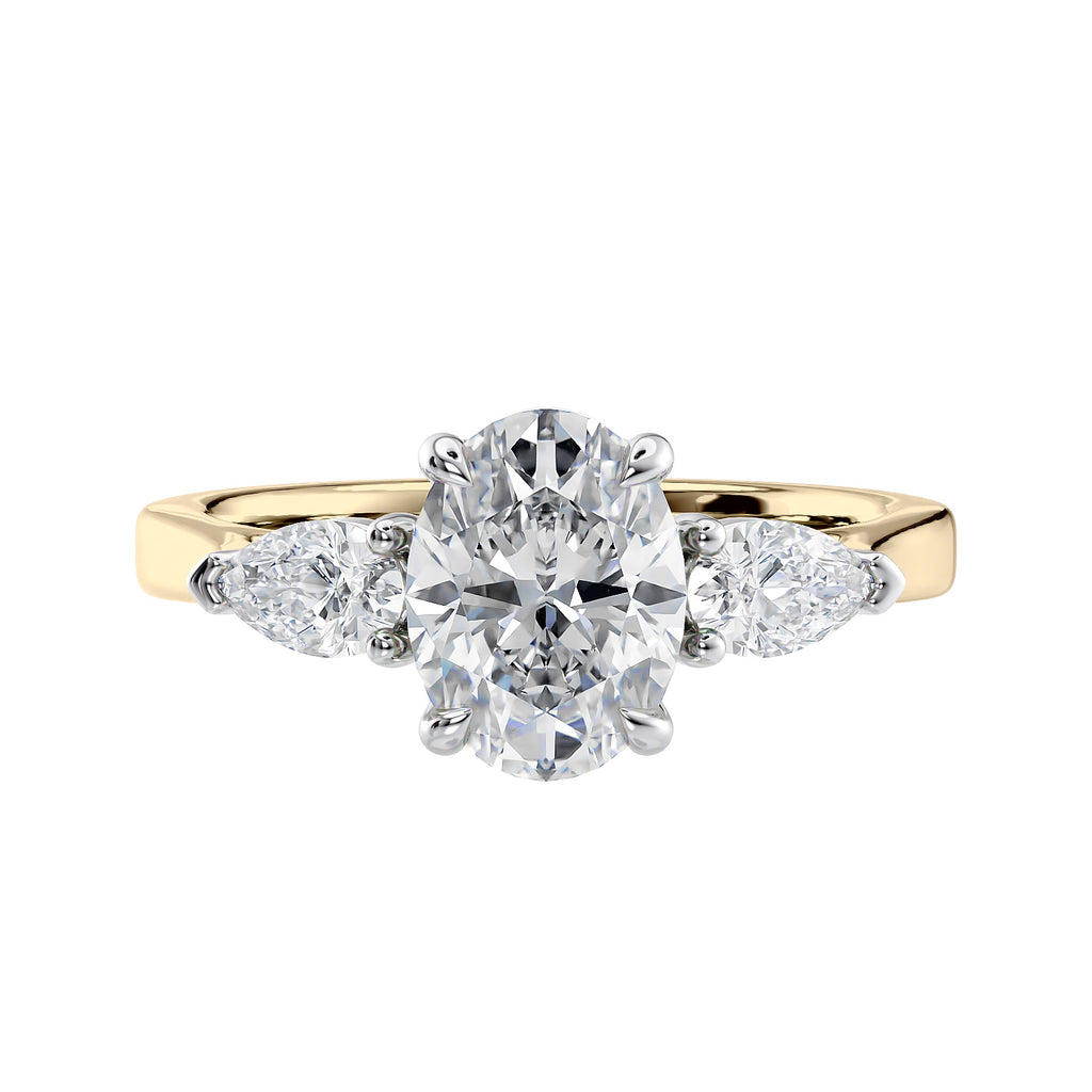 Oval natural diamond 3 stone engagement ring with pear shaped side stones 18ct gold front view.