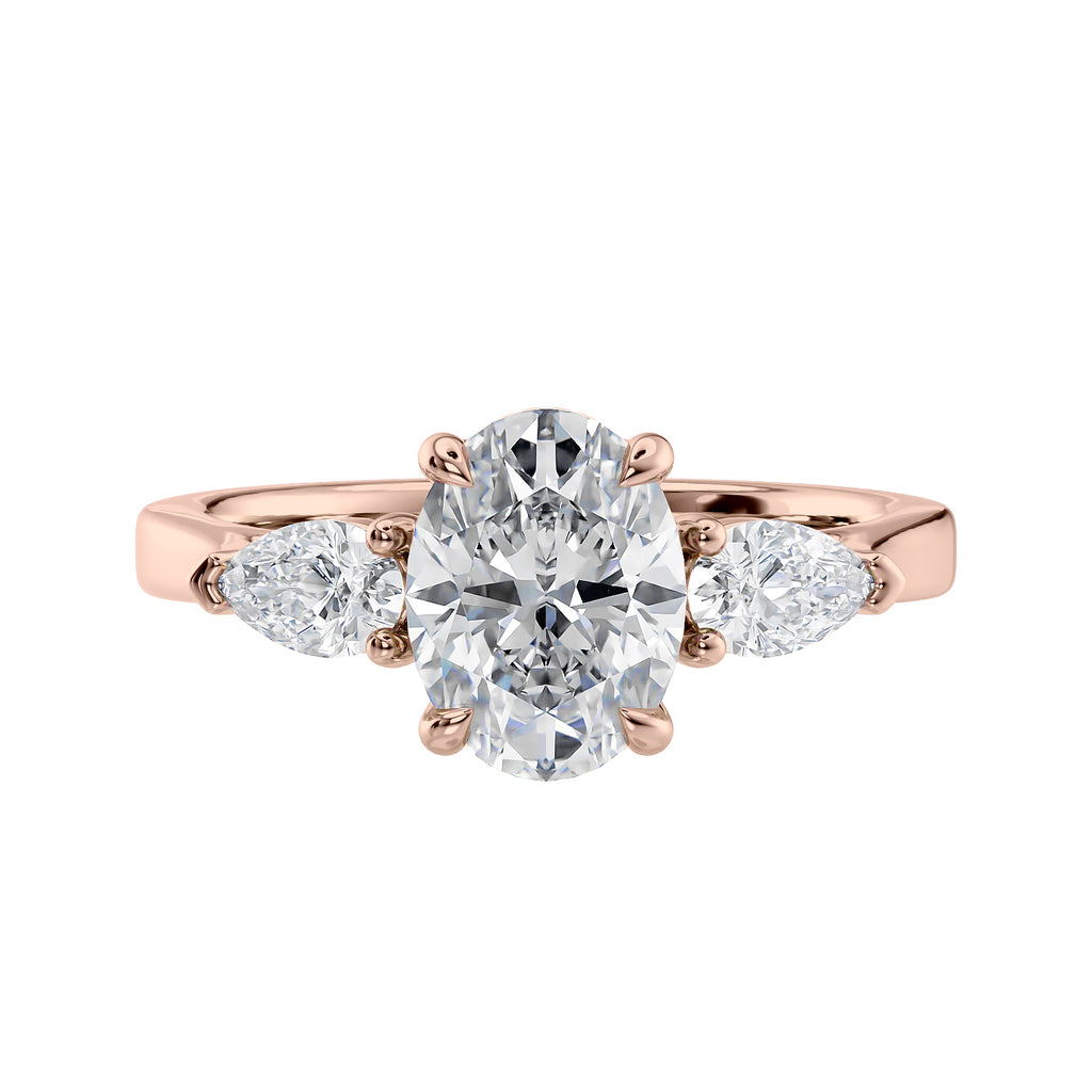 Oval natural diamond 3 stone engagement ring with pear shaped side stones 18ct rose gold front view.