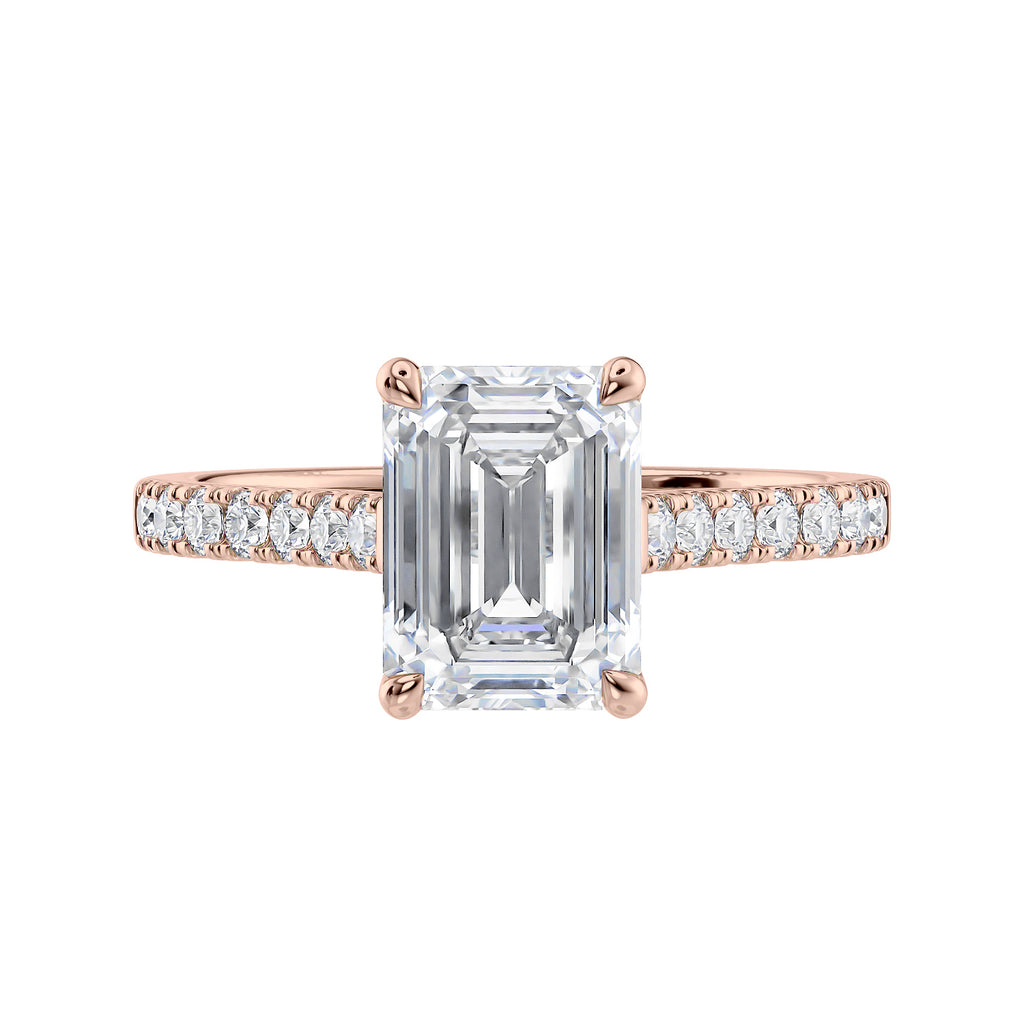 Emerald cut mined diamond engagement ring with castle set diamond band 18ct rose gold front view.