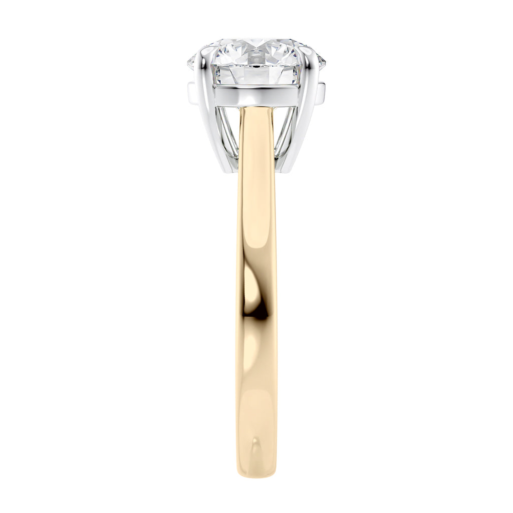 Classic round solitaire engagement ring in 18ct yellow gold end view.