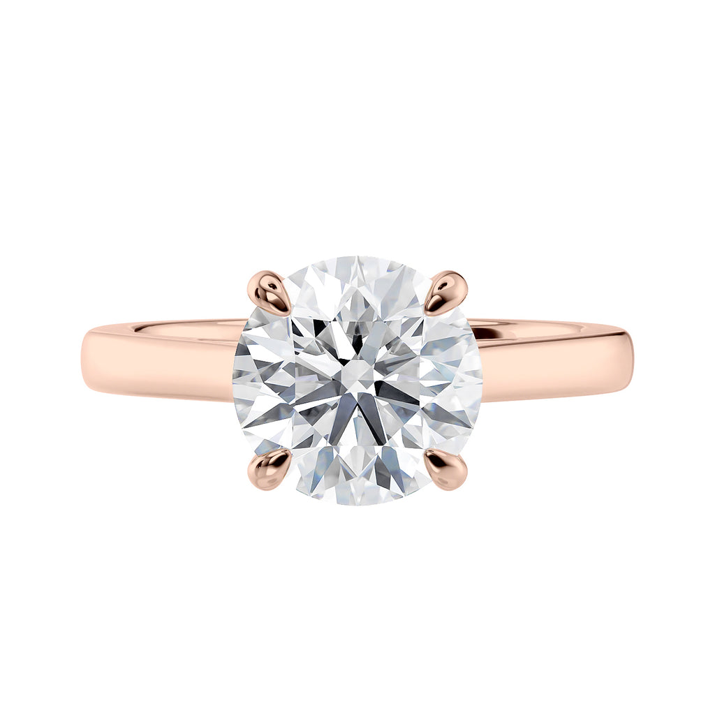 Rose gold classic round solitaire engagement ring front view.