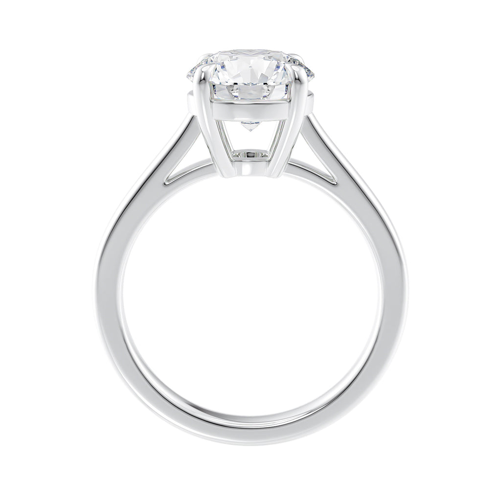 Classic round solitaire engagement ring in white gold side view.