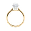 Emerald cut diamond hidden halo engagement ring 18ct gold side view.