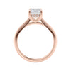 Emerald cut diamond hidden halo engagement ring 18ct rose gold side view.