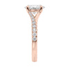 Oval diamond engagement ring with diamond set twist style band rose gold end view.