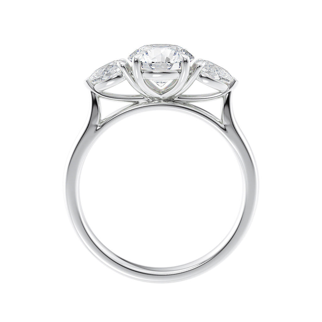 Lab grown diamond trilogy style engagement ring with pear sides white gold side view.
