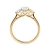 Laboratory grown diamond oval three stone diamond engagement ring with round side stones 18ct gold side view.