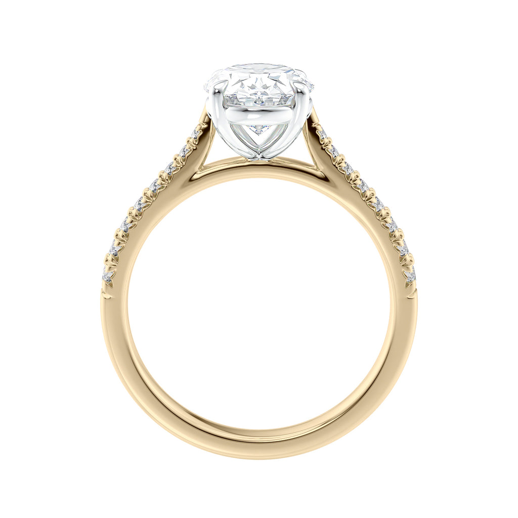 1 carat oval cut lab grown diamond engagement ring with castle set tapered diamond band gold side view.