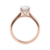 Lab grown diamond oval solitaire engagement ring with hidden halo 18ct rose gold side view.
