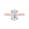 Lab grown diamond oval solitaire engagement ring with hidden halo 18ct rose gold front view.