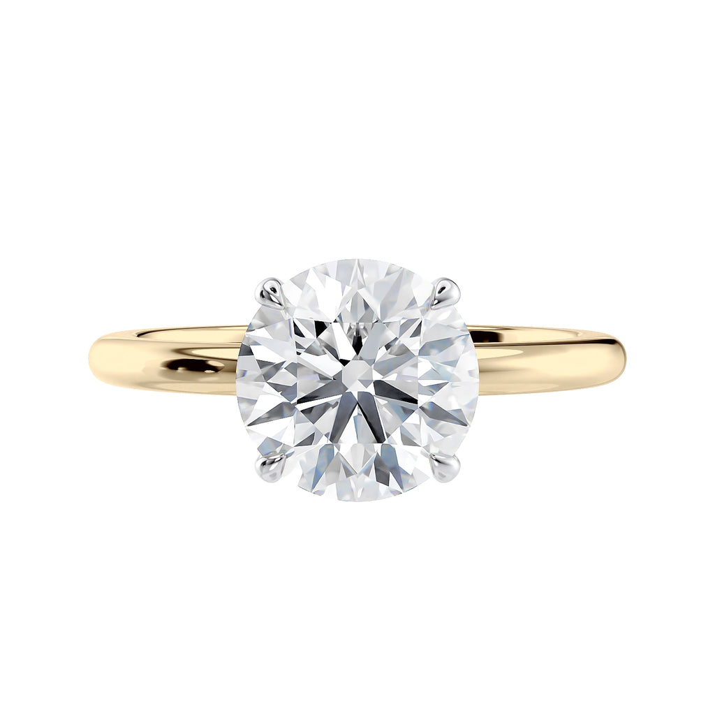 Round brilliant solitaire natural diamond engagement ring in yellow gold front view.