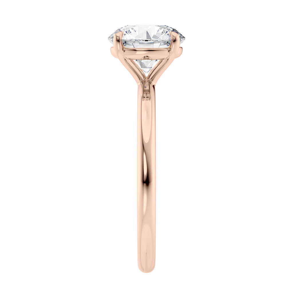 Round brilliant solitaire natural diamond engagement ring with a rose gold band end view.
