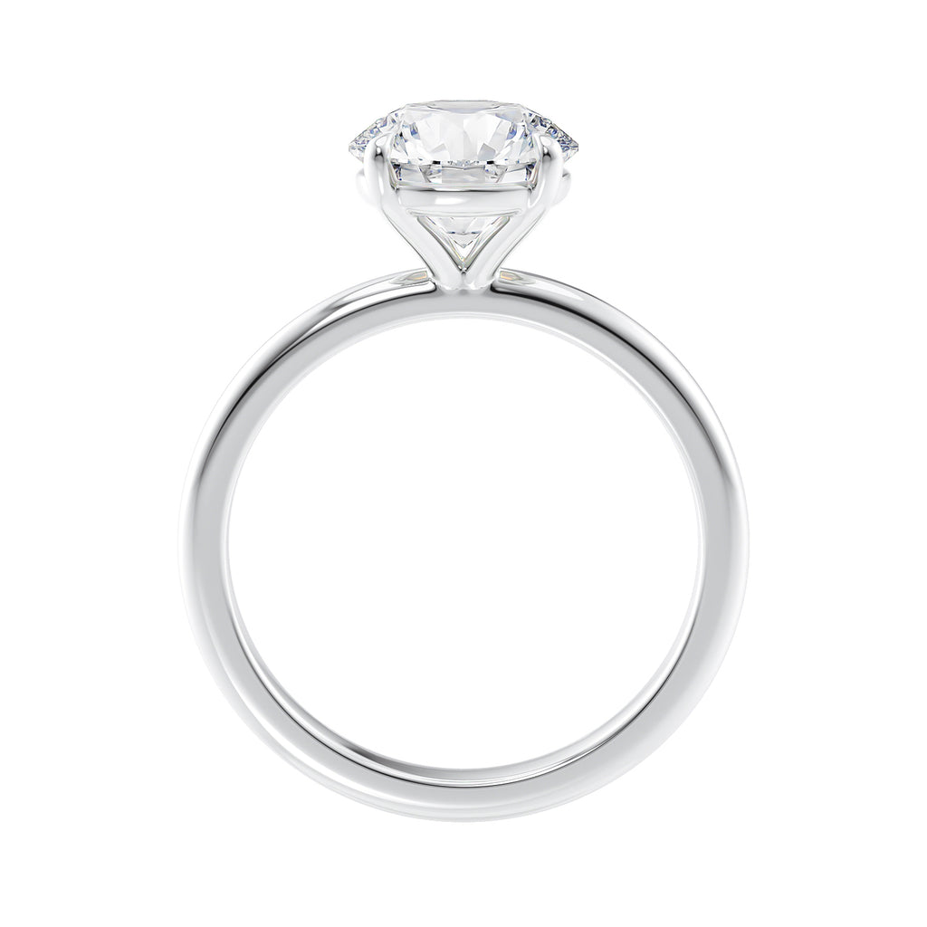 Round brilliant solitaire natural diamond engagement ring in white gold side view.