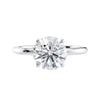 Round brilliant solitaire natural diamond engagement ring in white gold front view. 