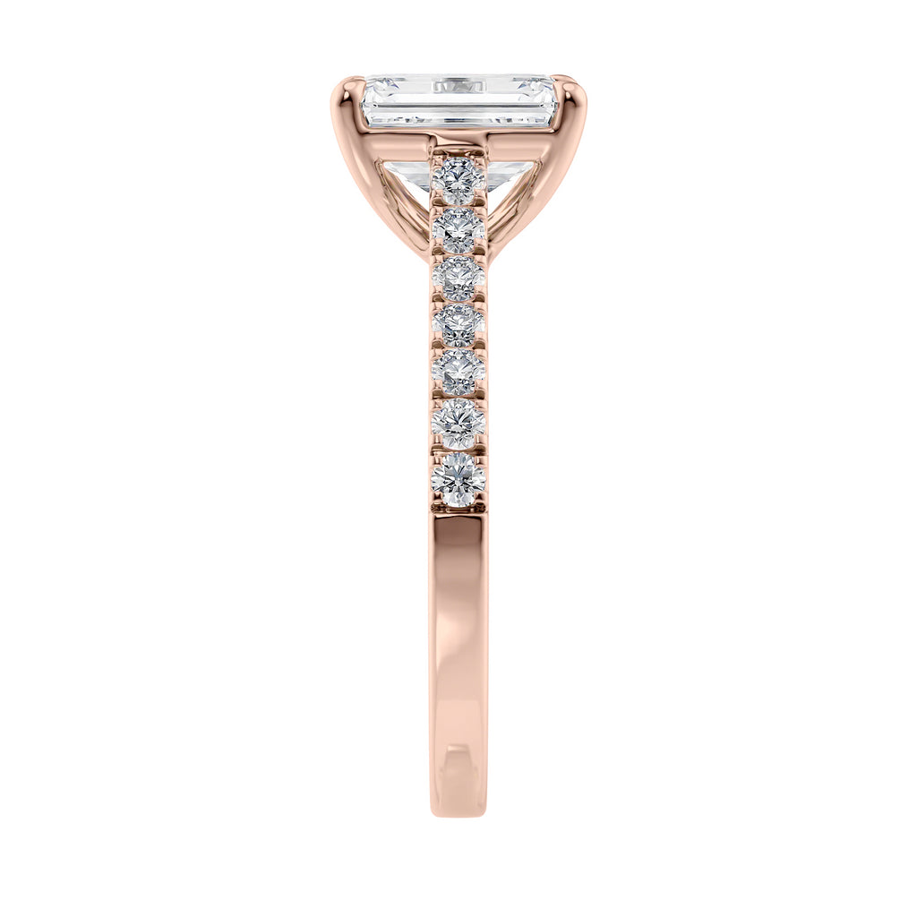 Emerald cut mined diamond engagement ring with castle set diamond band 18ct rose gold end view.