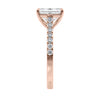 Emerald cut mined diamond engagement ring with castle set diamond band 18ct rose gold end view.