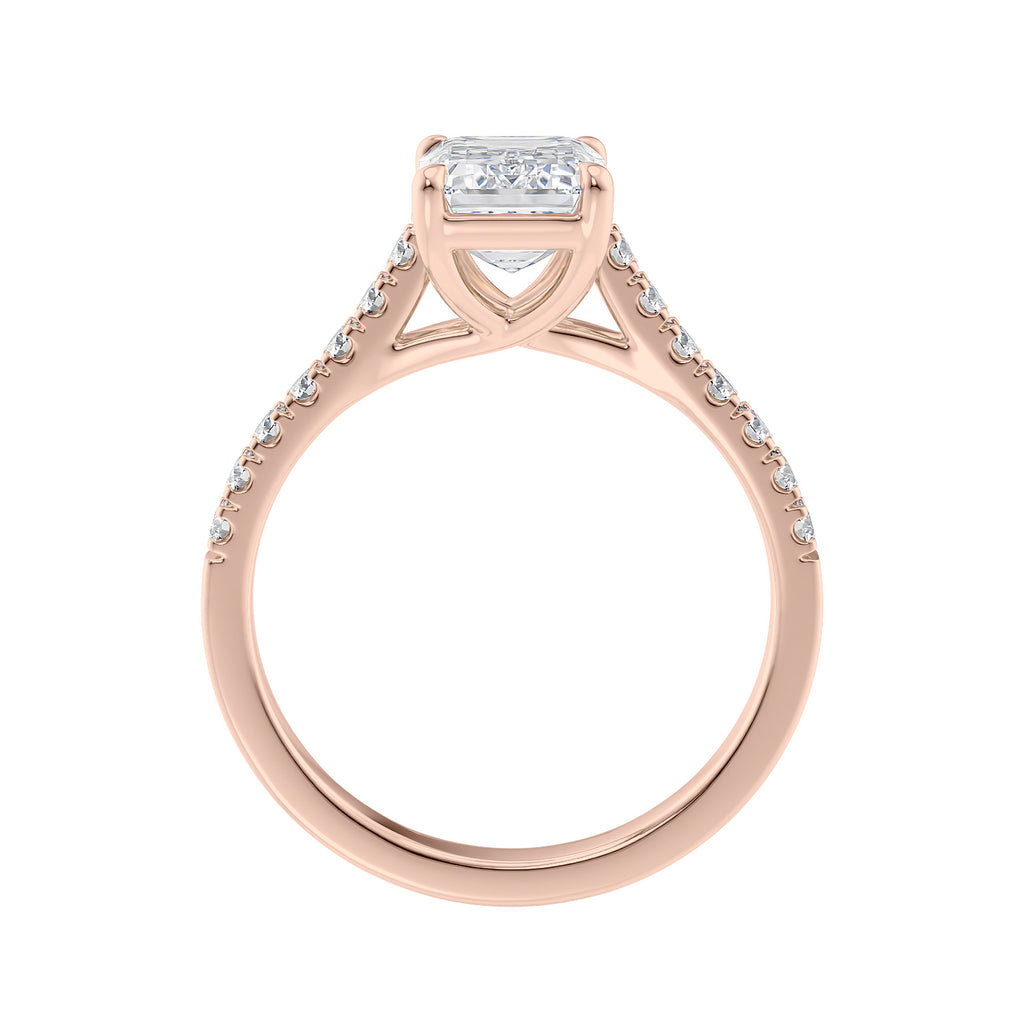 Emerald cut mined diamond engagement ring with castle set diamond band 18ct rose gold side view.