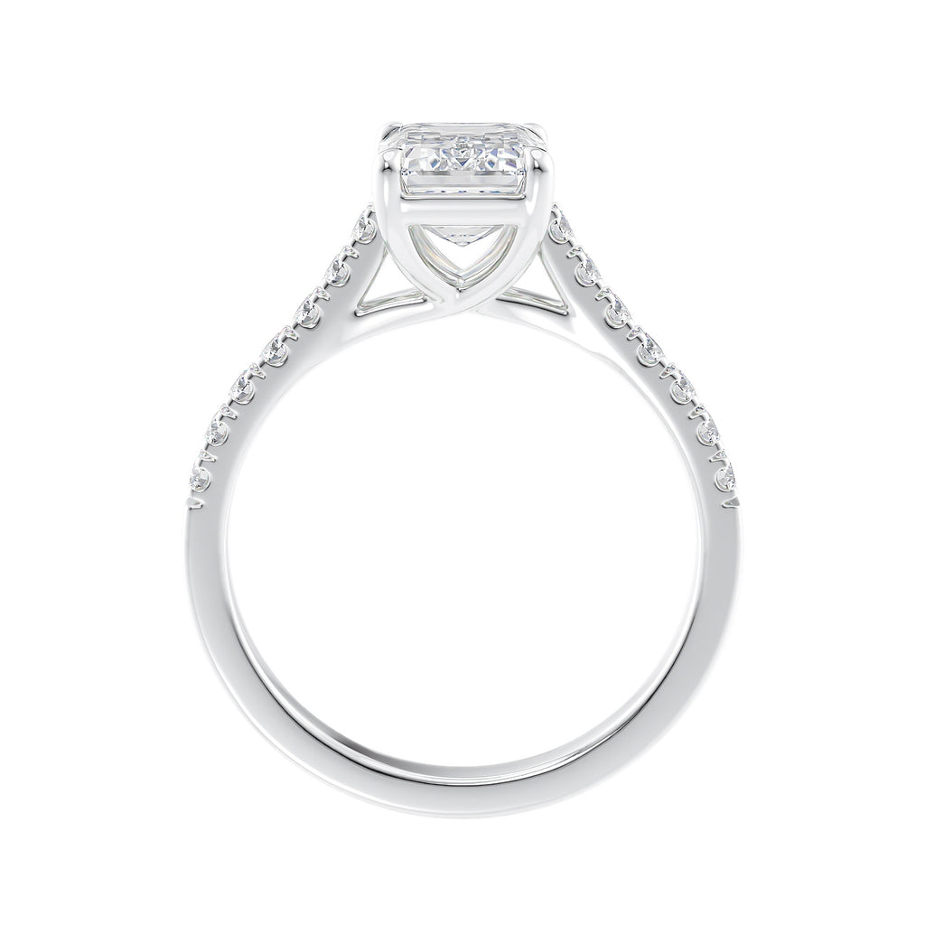 Emerald cut mined diamond engagement ring with castle set diamond band 18ct white gold side view.