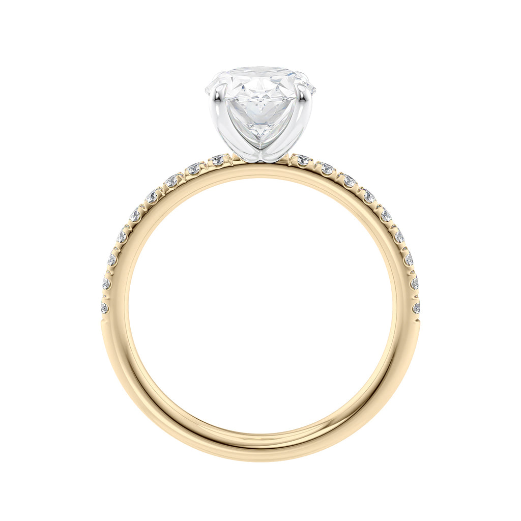 Oval diamond engagement ring with diamond band gold side view.