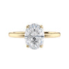 Lab grown oval diamond solitaire engagement ring with contemporary setting 18ct gold front view.