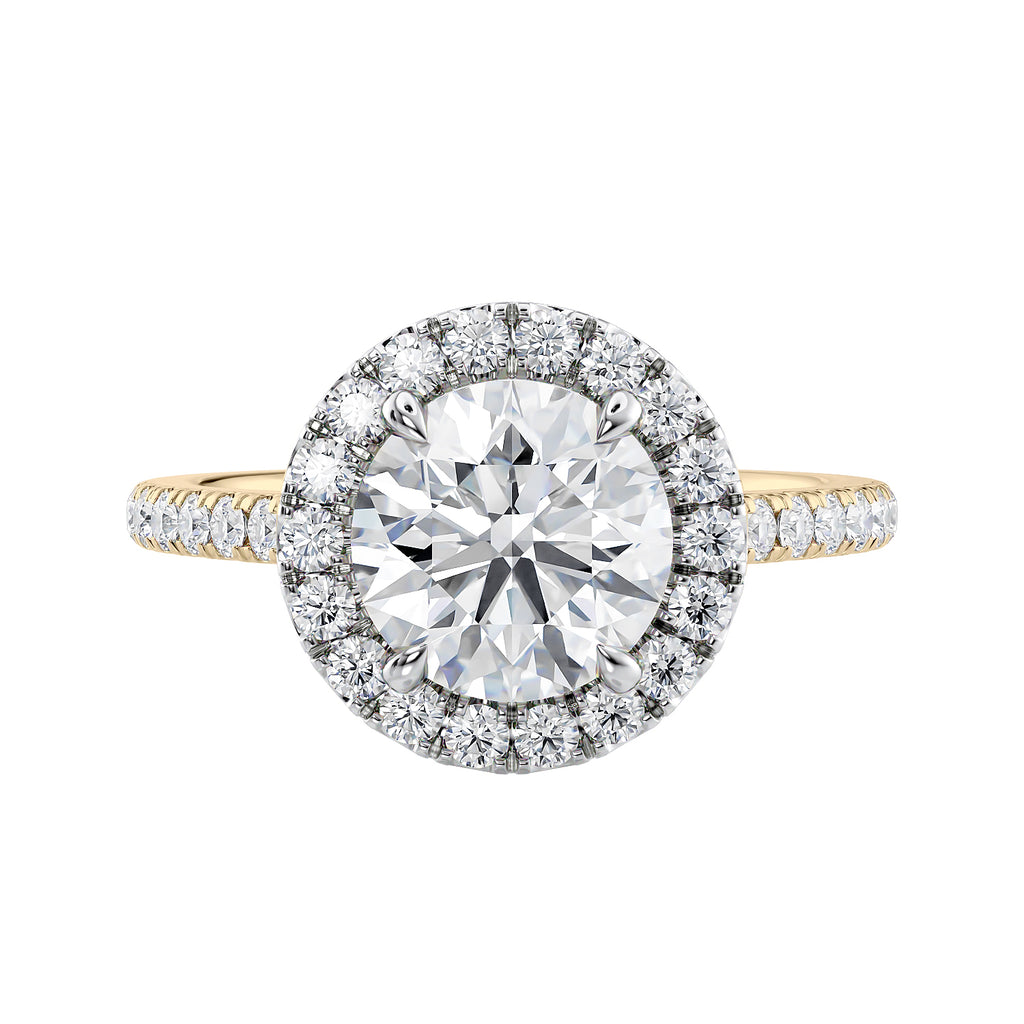 Round natural halo diamond engagement ring gold front view.