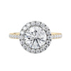Round natural halo diamond engagement ring gold front view.