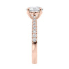 Round natural diamond 18ct rose gold tapered band engagement ring end view.