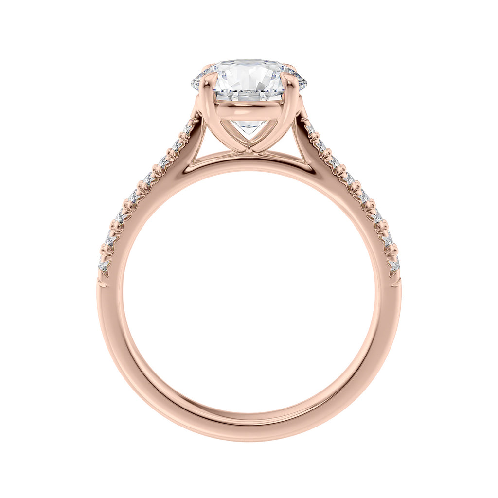 Round natural diamond 18ct rose gold tapered band engagement ring side view.