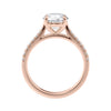 Round natural diamond 18ct rose gold tapered band engagement ring side view.