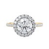 1.5 carat round cut lab grown diamond halo engagement ring with diamond band gold front view.