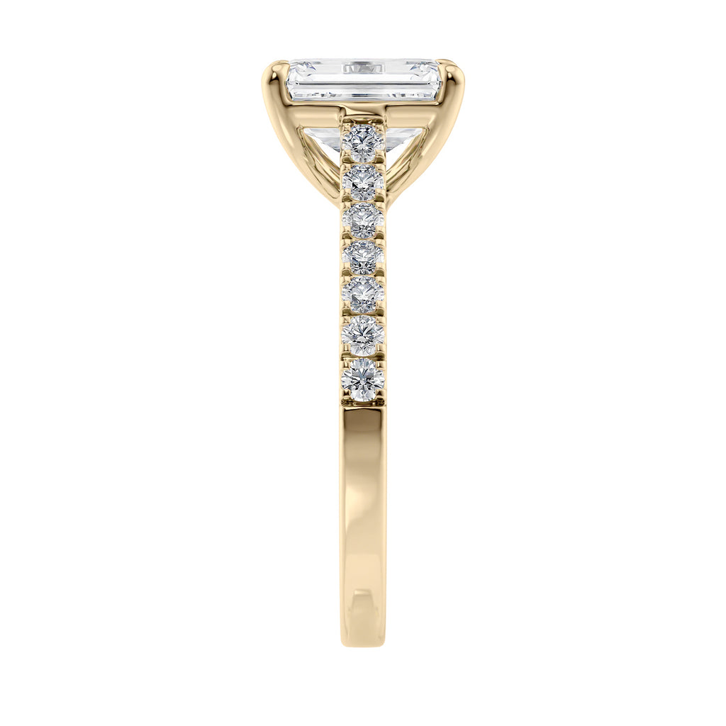 Emerald cut lab grown diamond engagement ring with castle set diamond band 18ct gold end view.