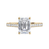 Emerald cut lab grown diamond engagement ring with castle set diamond band 18ct gold front view.