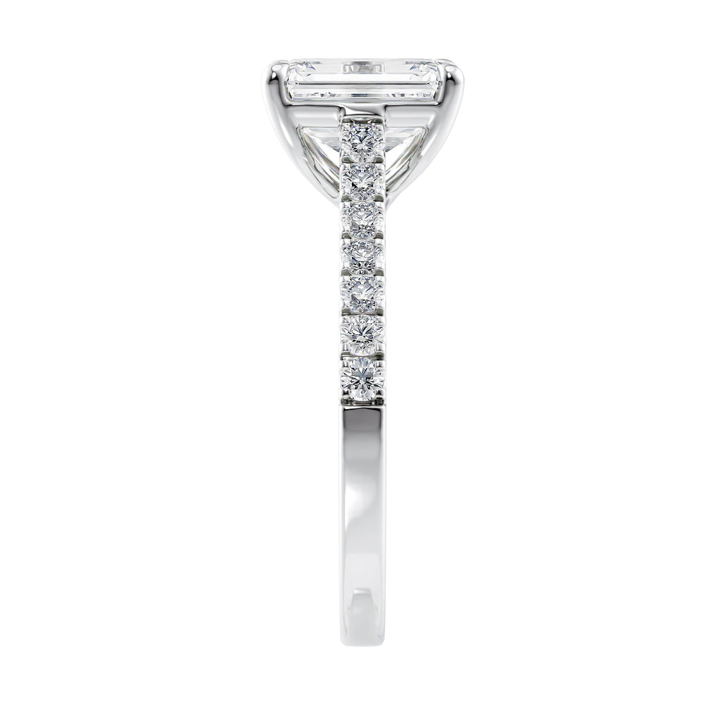 Emerald cut lab grown diamond engagement ring with castle set diamond band 18ct white gold side view.