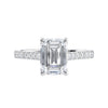 Emerald cut lab grown diamond engagement ring with castle set diamond band 18ct white gold front view.