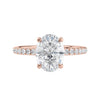 Laboratory grown diamond oval solitaire engagement ring with slim diamond band 18ct rose gold front view.