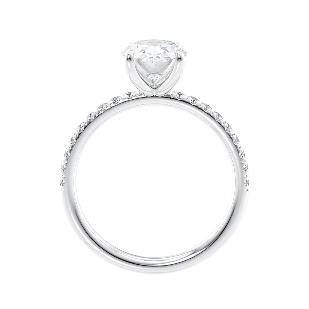 Laboratory grown diamond oval solitaire engagement ring with slim diamond band white gold side view.