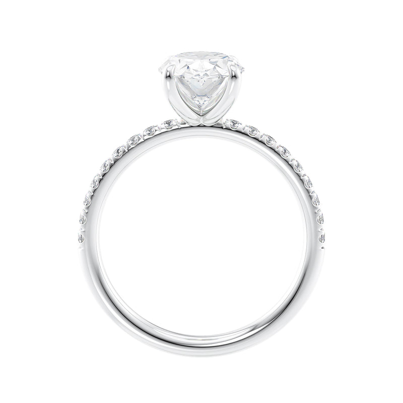Laboratory grown diamond oval solitaire engagement ring with slim diamond band white gold side view.