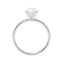 Laboratory grown diamond oval solitaire engagement ring with slim diamond band white gold side view.