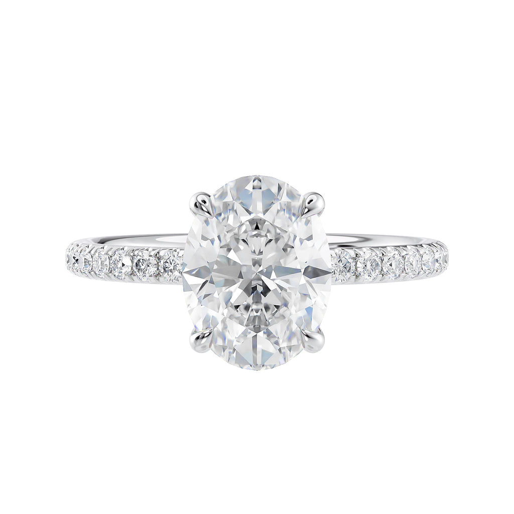 Laboratory grown diamond oval solitaire engagement ring with slim diamond band white gold front view.