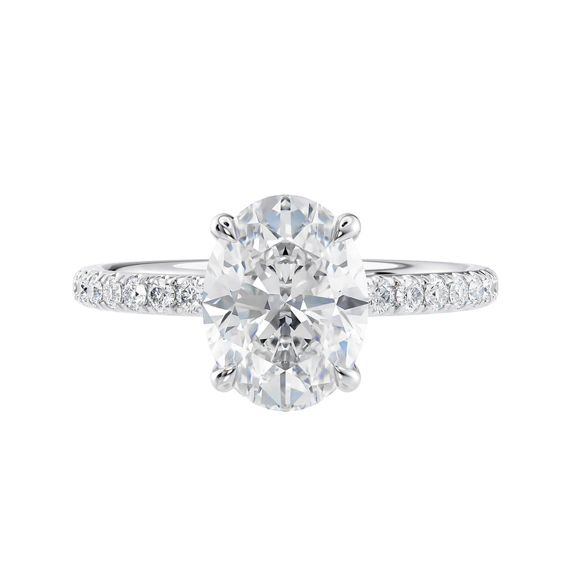 Laboratory grown diamond oval solitaire engagement ring with slim diamond band white gold front view.