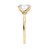 Oval cut diamond engagement ring in contemporary style setting 18 carat gold end view.