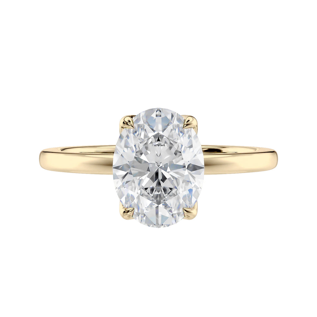 Oval cut diamond engagement ring in contemporary style setting 18 carat gold front view.