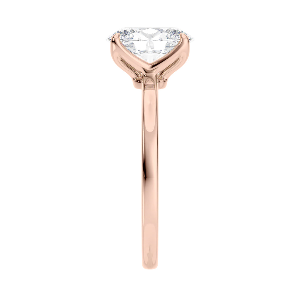 Oval cut diamond engagement ring in contemporary style setting 18 carat rose gold end view.