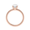 Oval cut diamond engagement ring in contemporary style setting 18 carat rose gold side view.