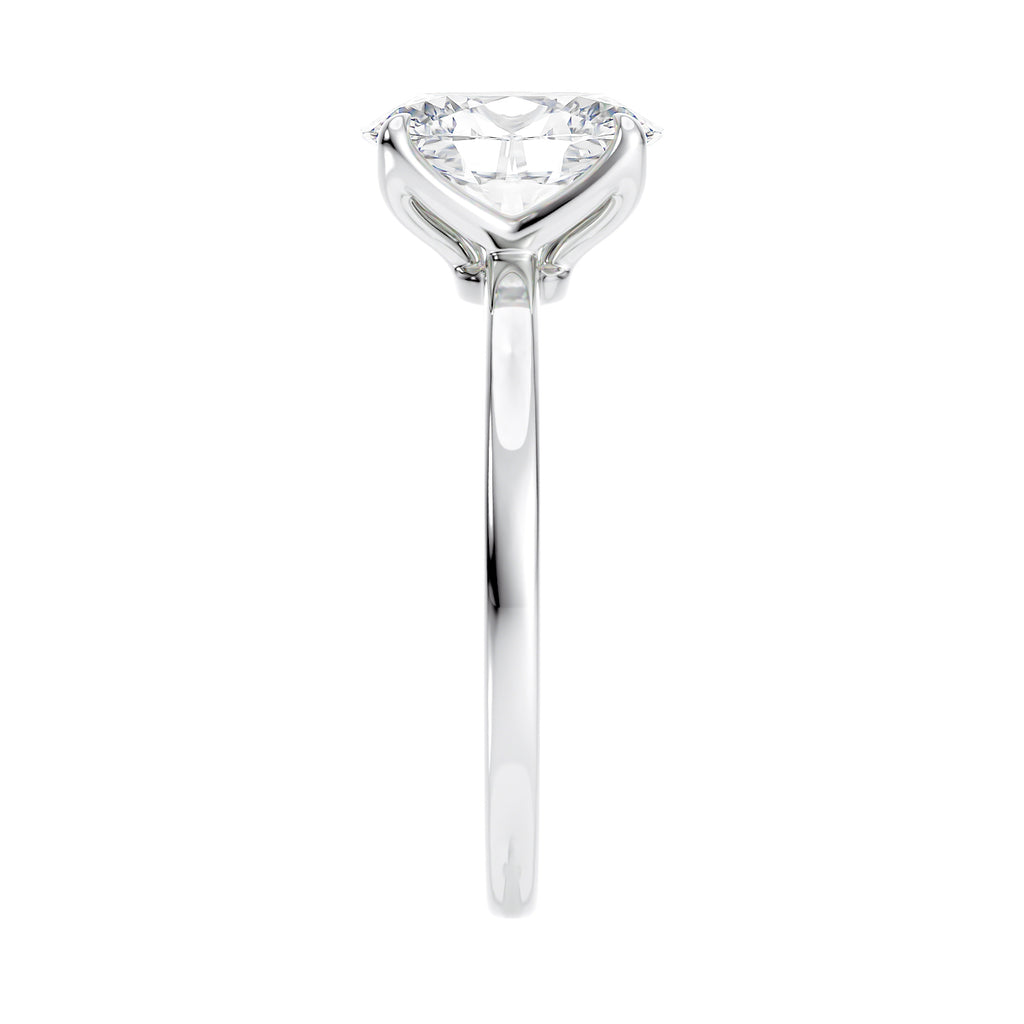 Oval cut diamond engagement ring in contemporary style setting 18 carat white gold end view.