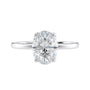 Oval cut diamond engagement ring in contemporary style setting 18 carat white gold front view.