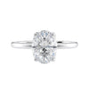 Oval cut diamond engagement ring in contemporary style setting 18 carat white gold front view.
