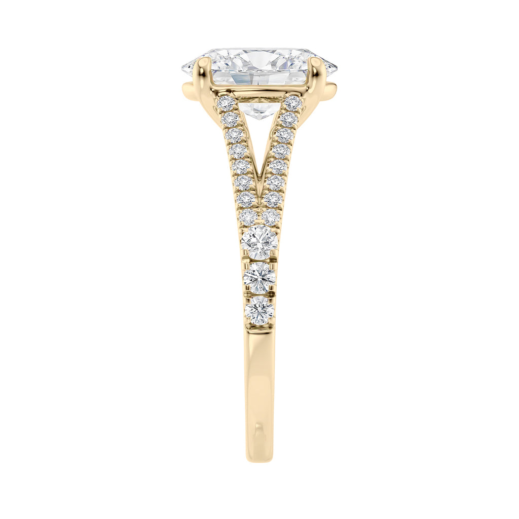 Oval cut diamond engagement ring with diamond set split band 18ct gold end view.